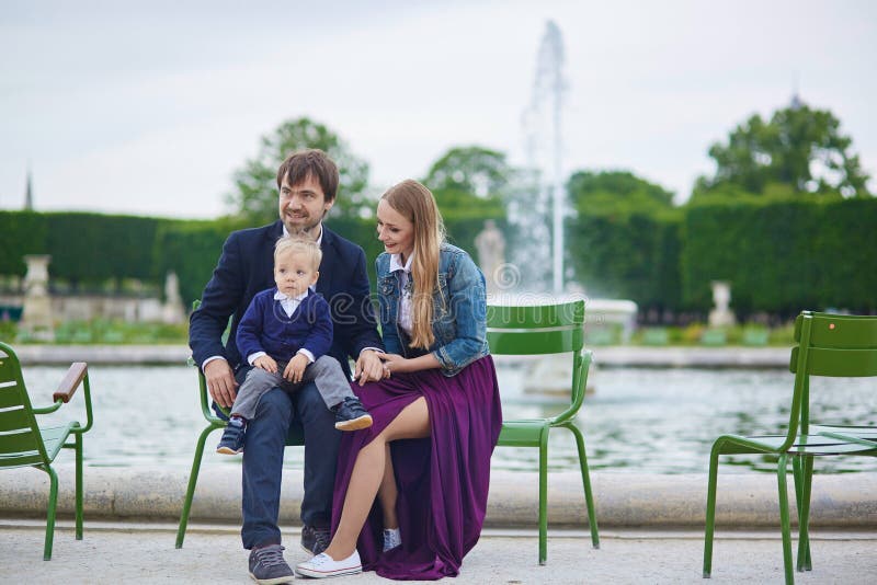 Happy family of three in Paris