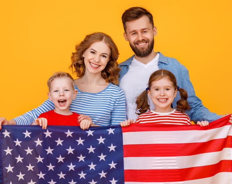 Happy family with the USA flag royalty free stock image Happy family with the USA flag royalty free stock image