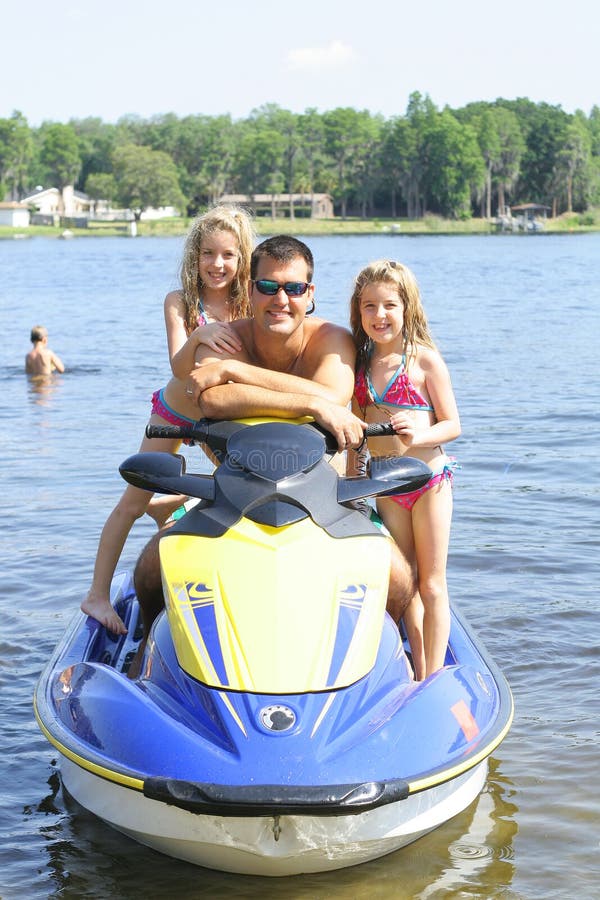 Happy family on the water