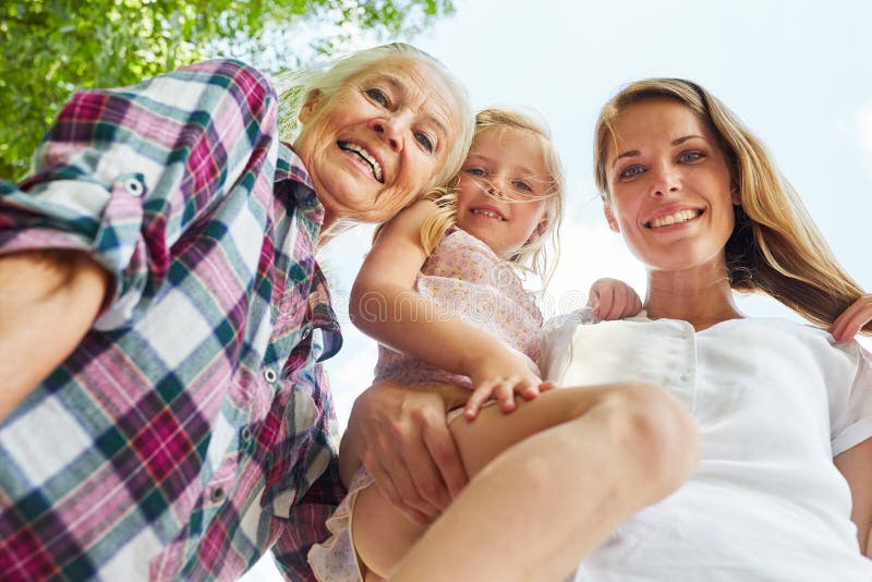 Happy family with women in 3 generations stock images Happy family with women in 3 generations stock images