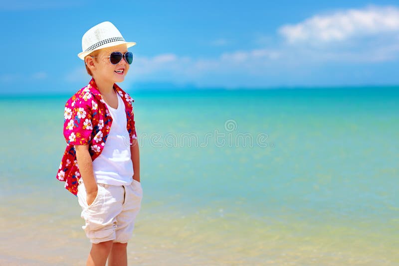 Happy Fashionable Kid Boy Enjoys Life On Summer Beach Stock Image