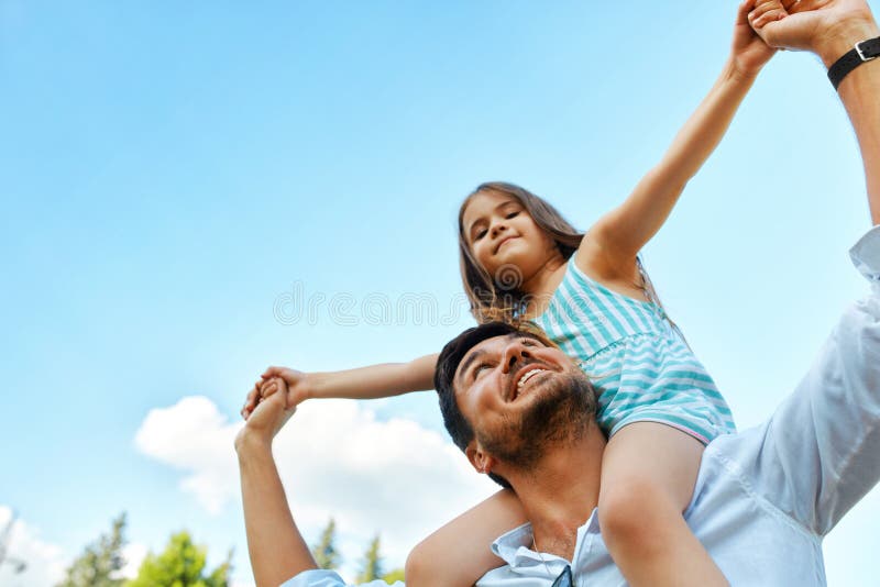 Happy Father And Child Having Fun Playing Outdoors. Family Time