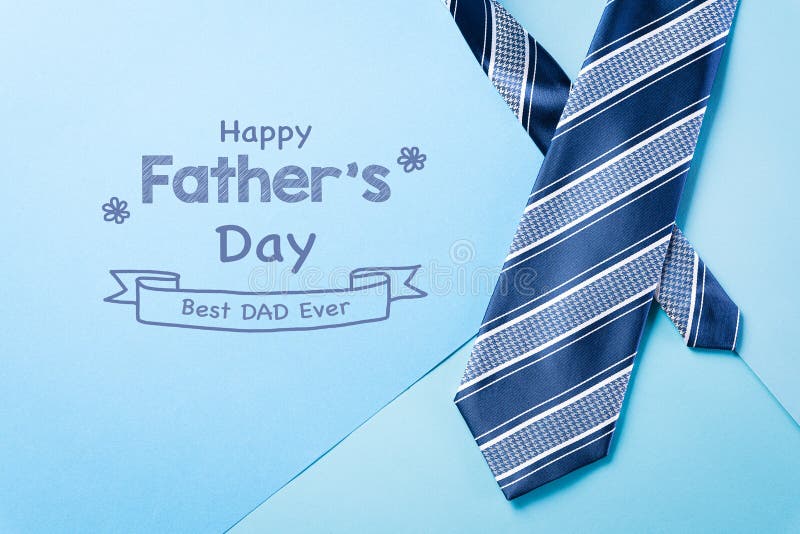 Happy Fathers Day background concept with blue necktie and the text ` Happy Father`s Day`  on bright pastel background.