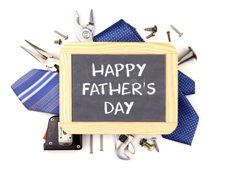 Happy Fathers Day message on a chalkboard with underlying frame of tools and ties isolated on a white background. Happy Fathers Day message on a chalkboard with underlying frame of tools and ties isolated on a white background