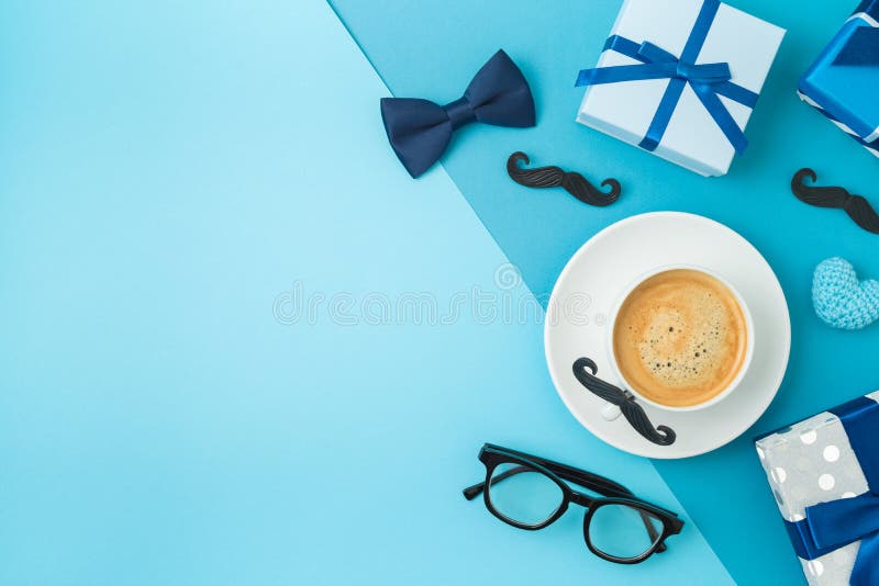 Happy Fathers day concept with coffee cup,  tie bow and gift box on blue background