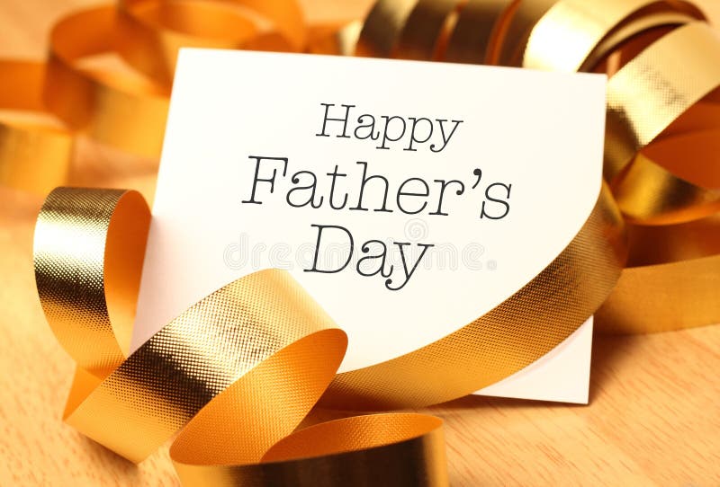 Happy fathers day with gold decoration. Father's Day is held on the third Sunday of June in the United Kingdom.