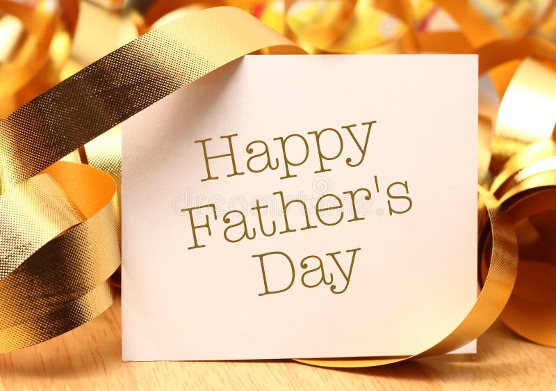 Happy fathers day with gold decoration. Father's Day is held on the third Sunday of June in the United Kingdom.