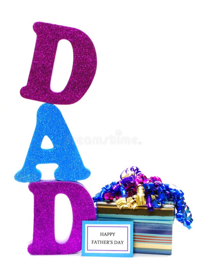 Shiny letters spelling DAD with gift box and Happy Fathers Day tag