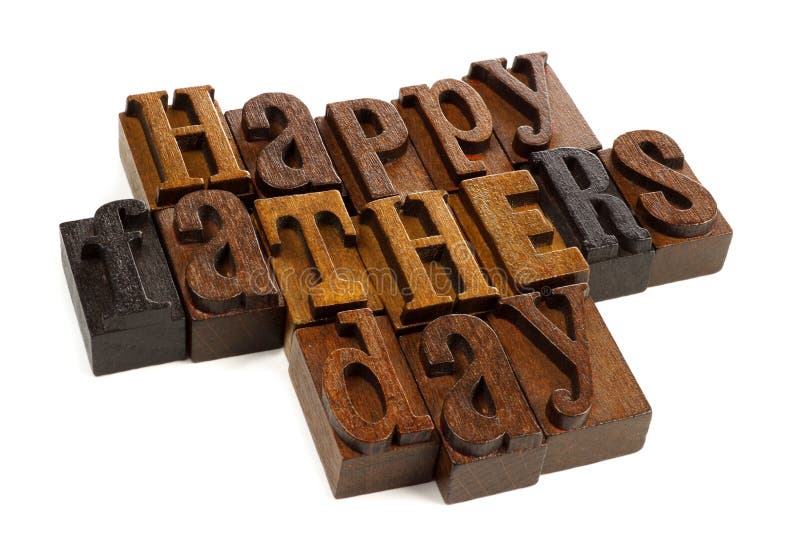 Happy Fathers day vintage wooden letters against a white background. Happy Fathers day vintage wooden letters against a white background