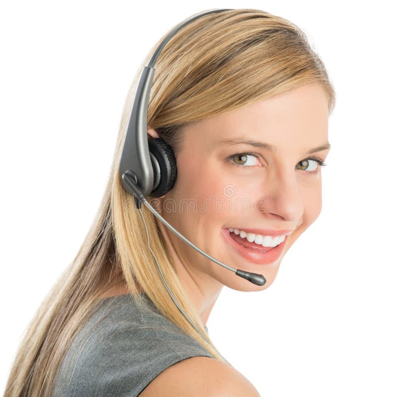 Close-up portrait of happy female customer service representative wearing headset isolated over white background