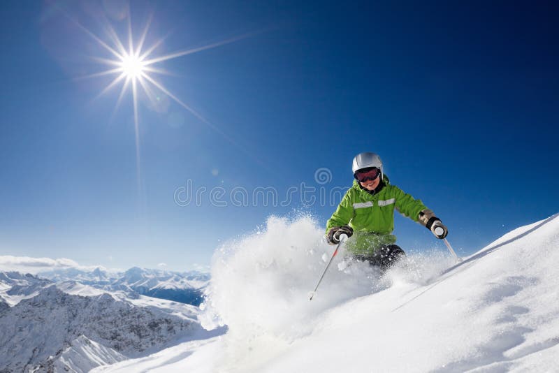 Happy female skier with mountain view stock photos