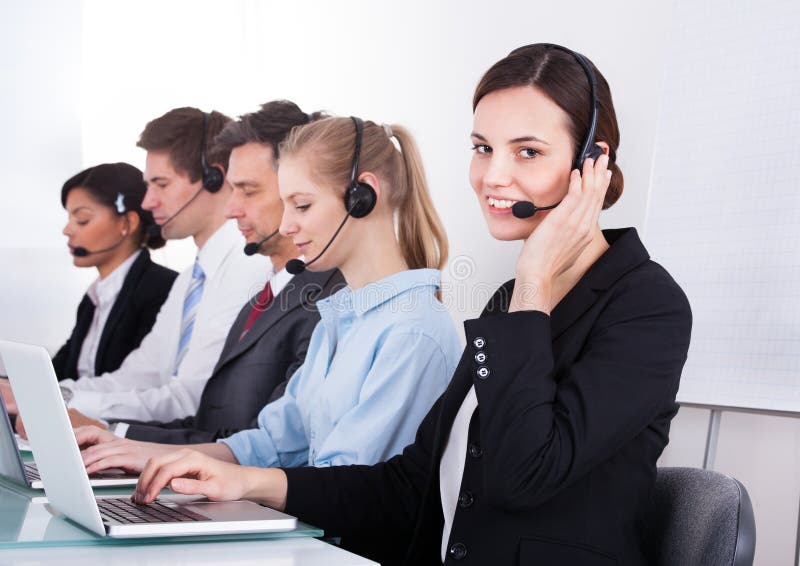 Happy female telephone worker