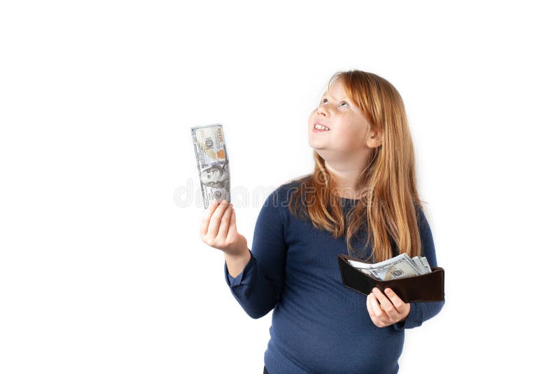 Happy fett Girl, das Dollars in den Händen hält Geld für Spielzeug und Süßigkeiten stockbilder Happy fett Girl, das Dollars in den Händen hält Geld für Spielzeug und Süßigkeiten stockbilder