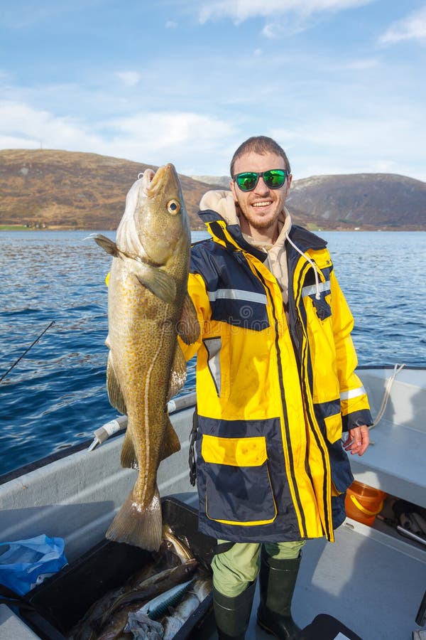 Happy Fisherman with Cod Fish in Hands Stock Photo Image of hand