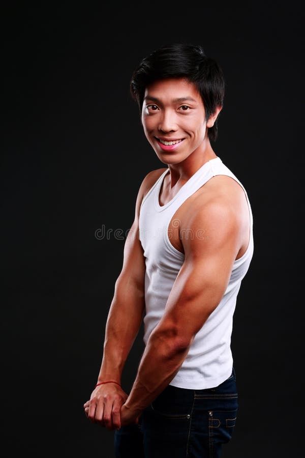 Happy fit asian man posing stock image. Image of copyspace - 43825829