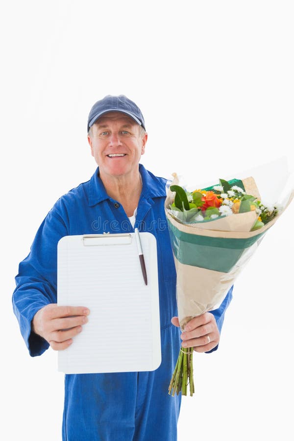 Happy Flower Delivery Man Showing Clipboard Stock Photos Free