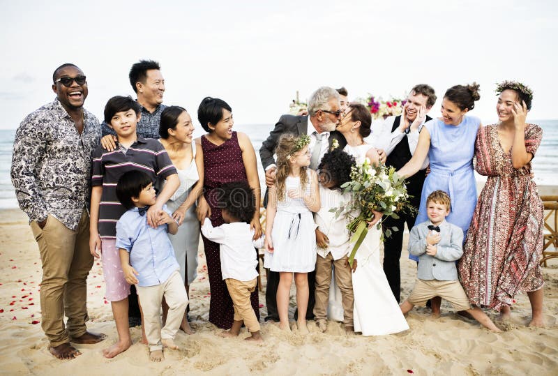 Happy friends and family at a wedding party stock photo Happy friends and family at a wedding party stock photo