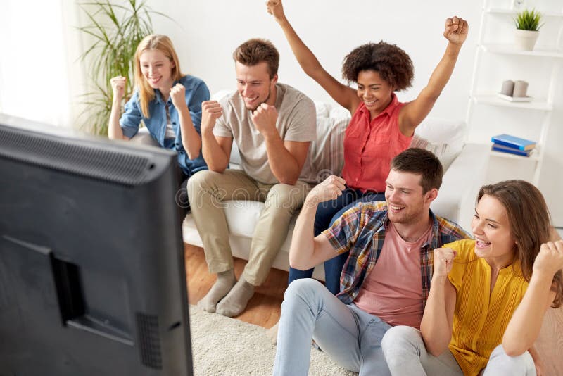 Happy Friends With Remote Watching Tv At Home Stock Image Image Of