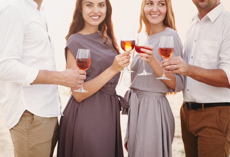 Happy friends resting together on shore and having picnic royalty free stock photos Happy friends resting together on shore and having picnic royalty free stock photos