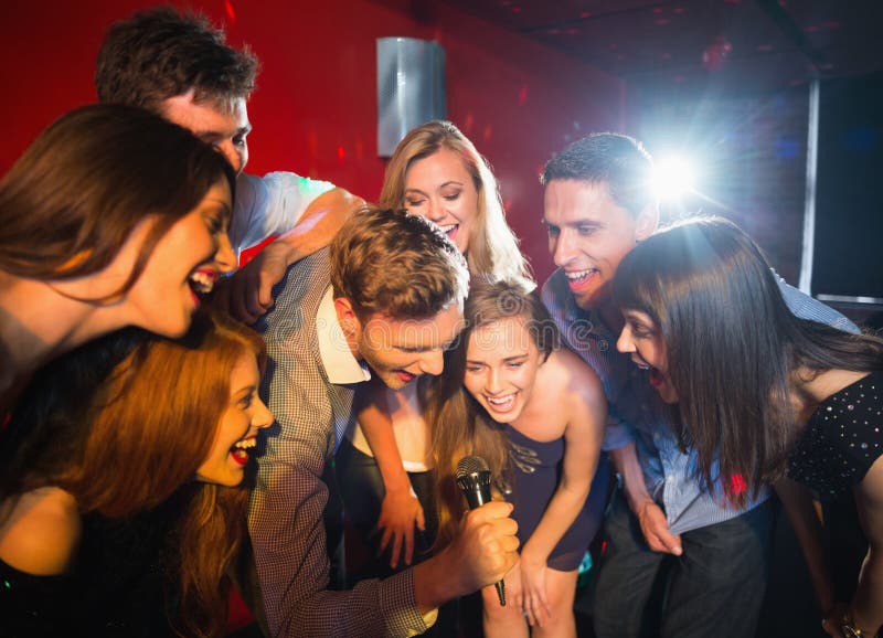 Happy Friends Singing Karaoke Together Stock Photo Image of
