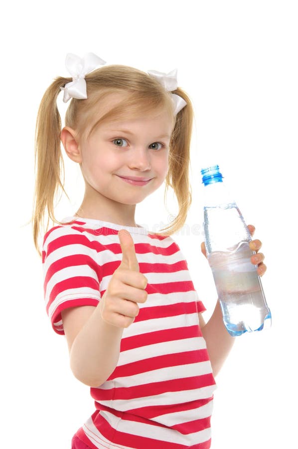 Happy girl with bottle of water smiling