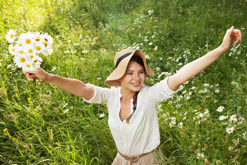 Happy Girl with a Bouquet of Daisies Stock Image - Image of laughing ...