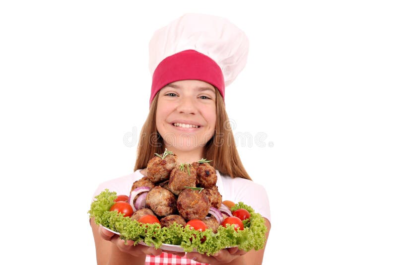 Happy girl cook with meatballs on plate