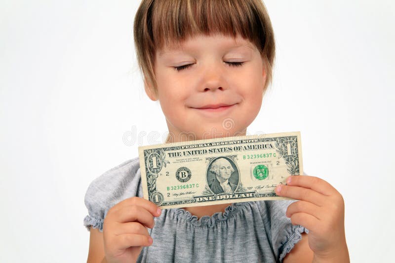 The happy girl with dollar in hands