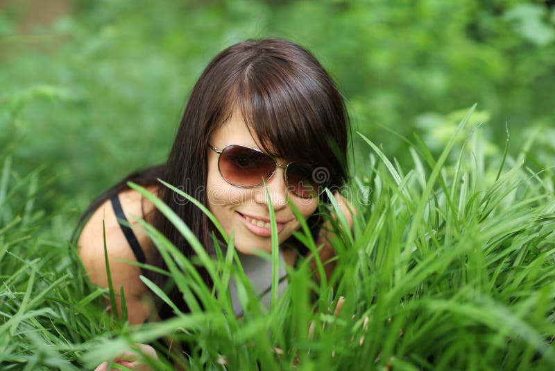 Happy girl green grass