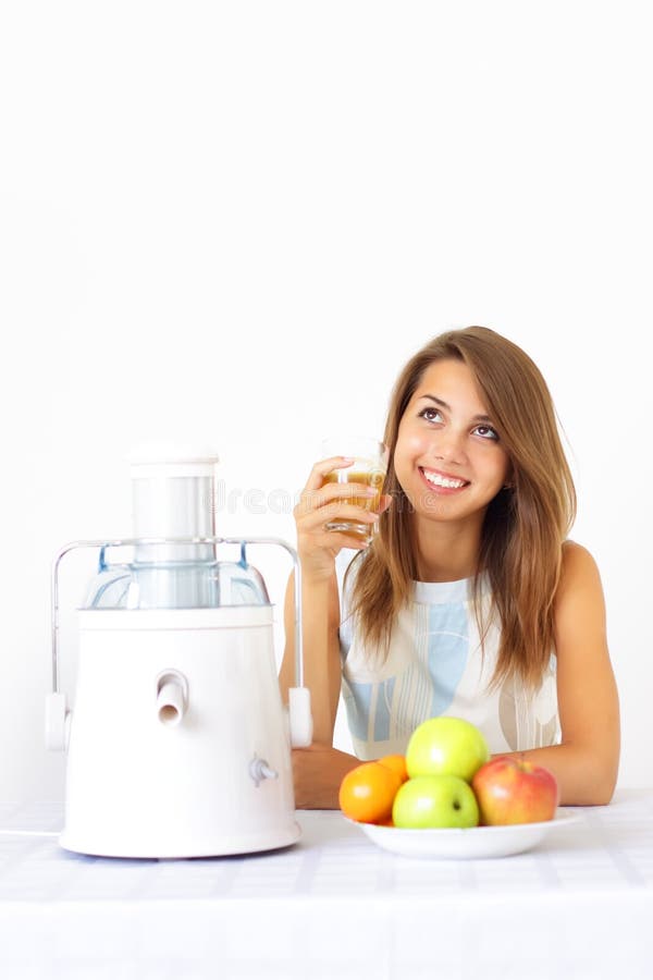 Happy girl about juicer