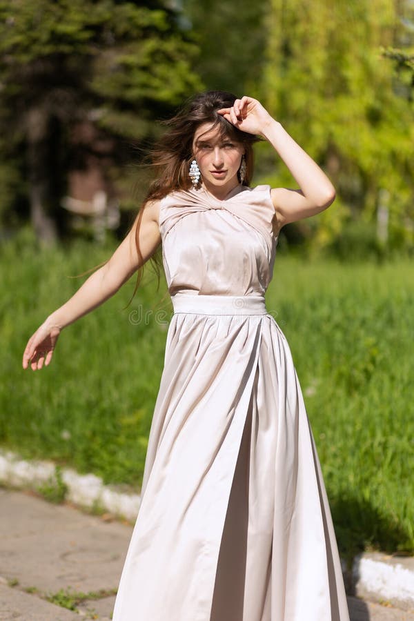 Happy Girl in Long Dress Posing on the Street Stock Photo - Image of ...