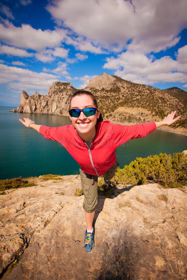 A Girl At Halt On The Mountain Top Stock Image - Image of tourism