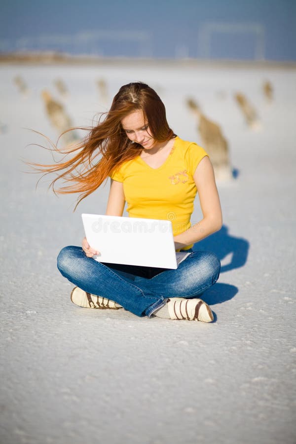 Happy girl with notebook