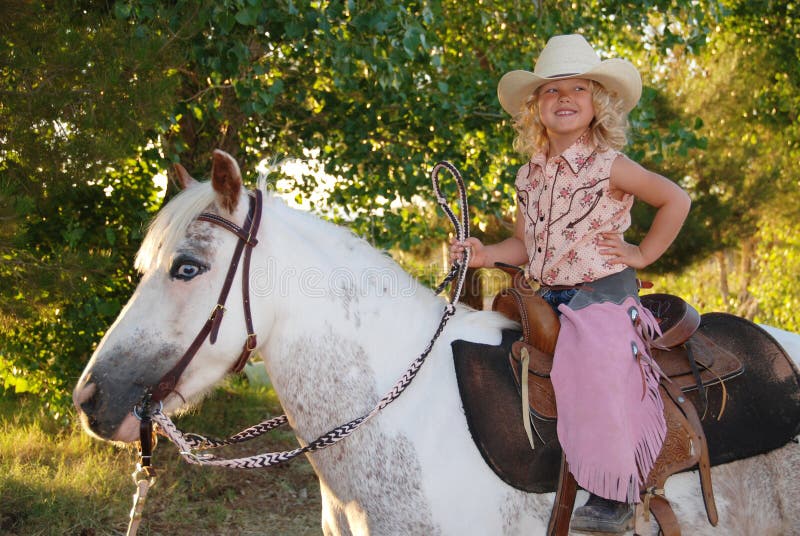 Happy girl with pony.