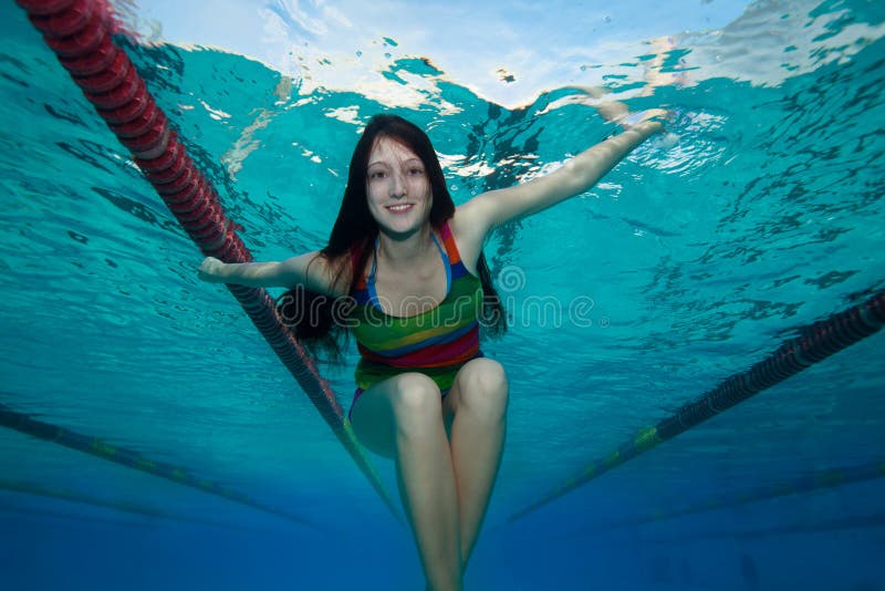 Happy girl in the pool