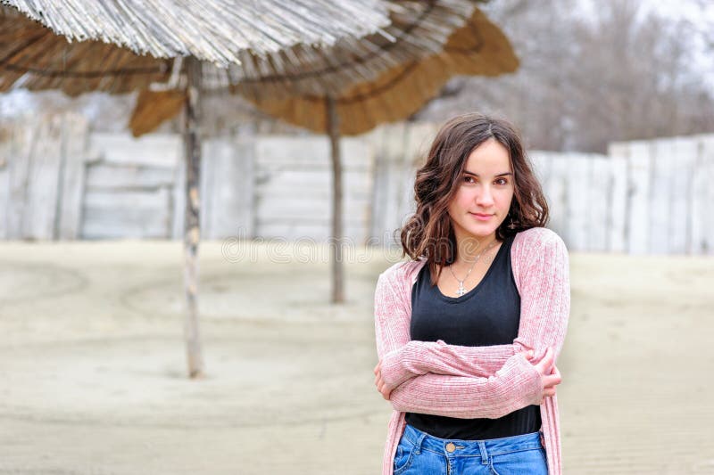 Portrait of beautiful positive happy sensitive young girl or woman posing outdoors in casual clothes with smile and adorable eyes royalty free stock images Portrait of beautiful positive happy sensitive young girl or woman posing outdoors in casual clothes with smile and adorable eyes royalty free stock images