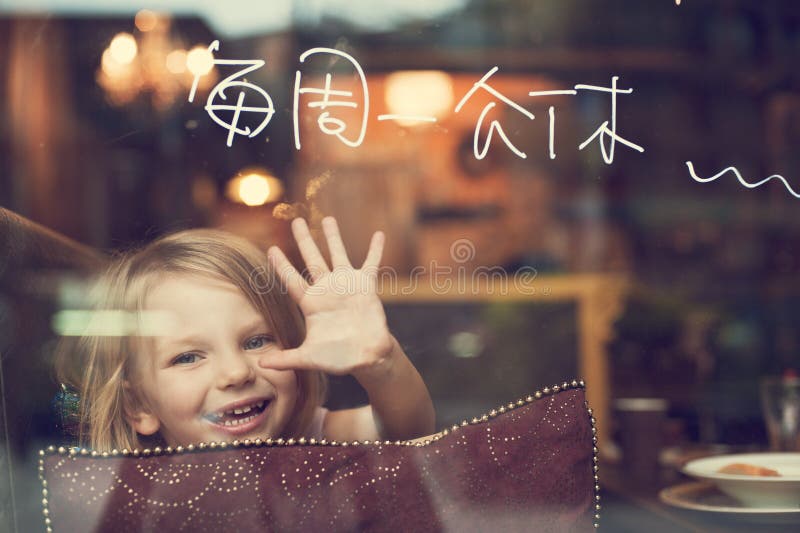 Happy girl in restaurant