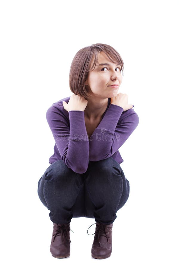 Crouching happy girl with short hair