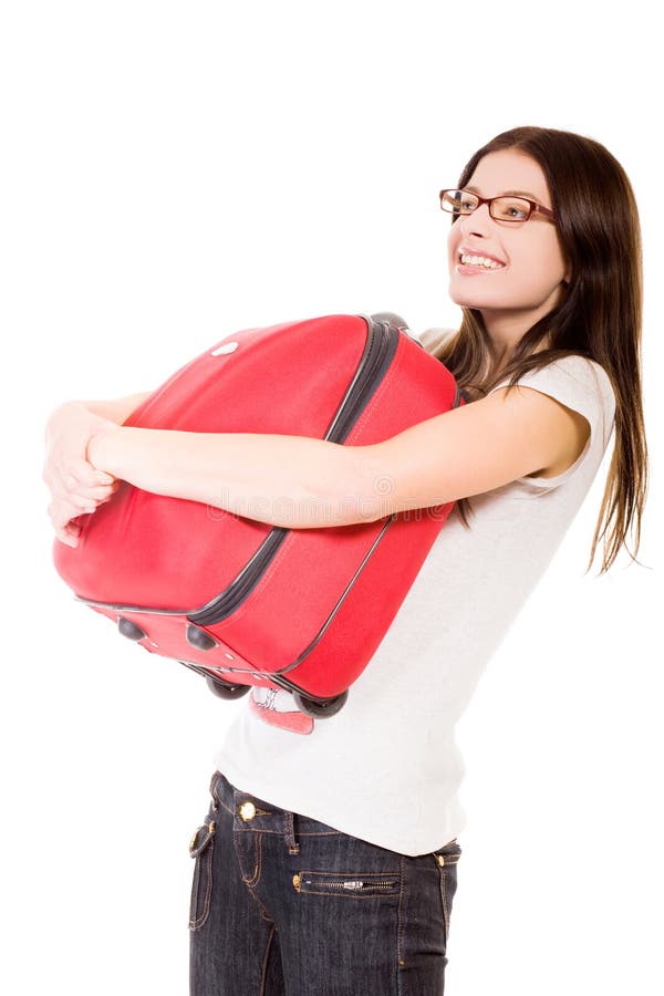 Happy girl with suitcase on a white background