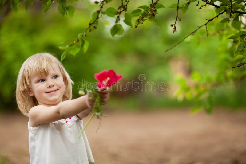 Happy girl with tulip