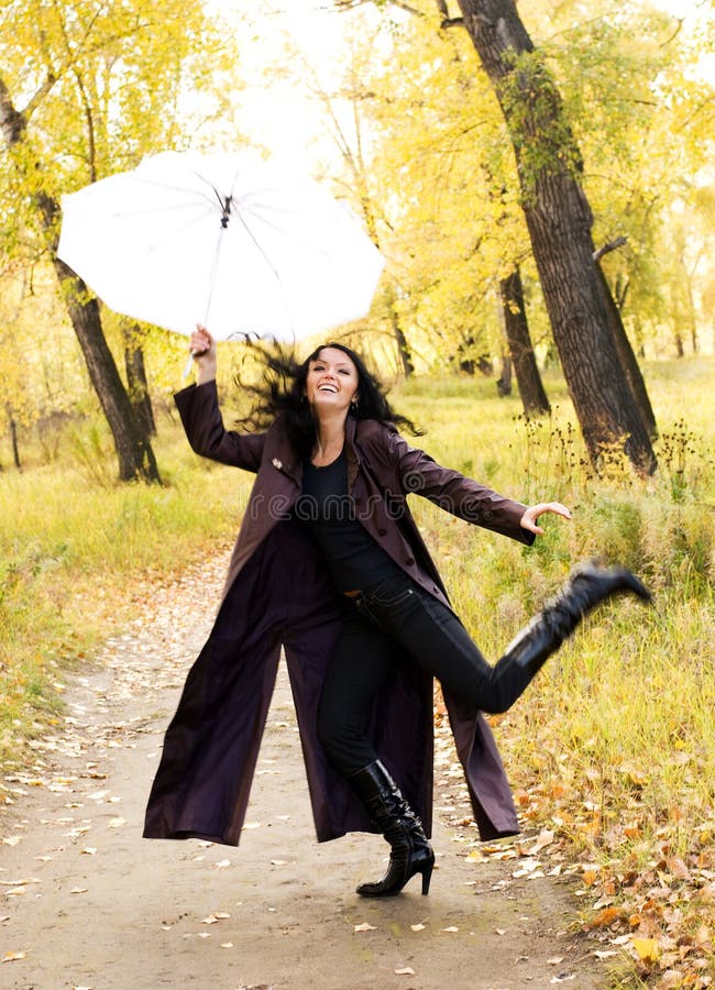 Happy girl with an umbrella