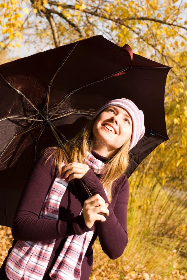 Happy girl with an umbrella