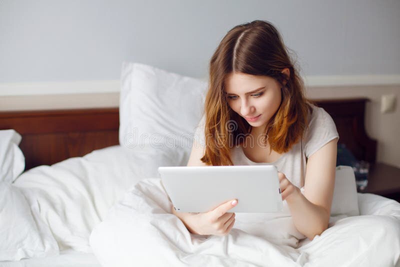 462 Girl Watching Videos Tablet Stock Photos photo