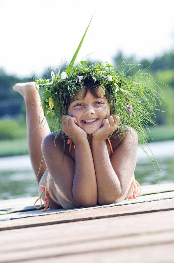 Happy girl with wreath