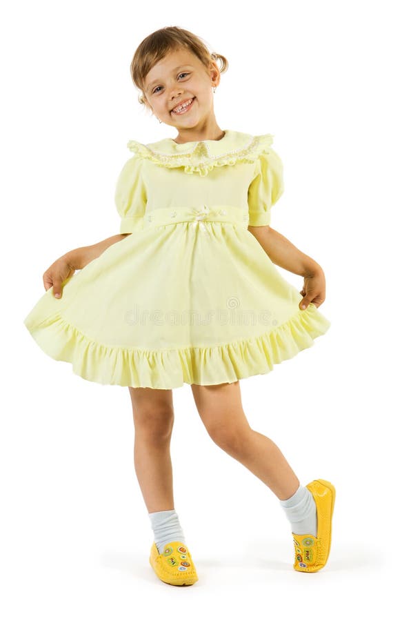 Happy girl in yellow dress. Isolate on white background.