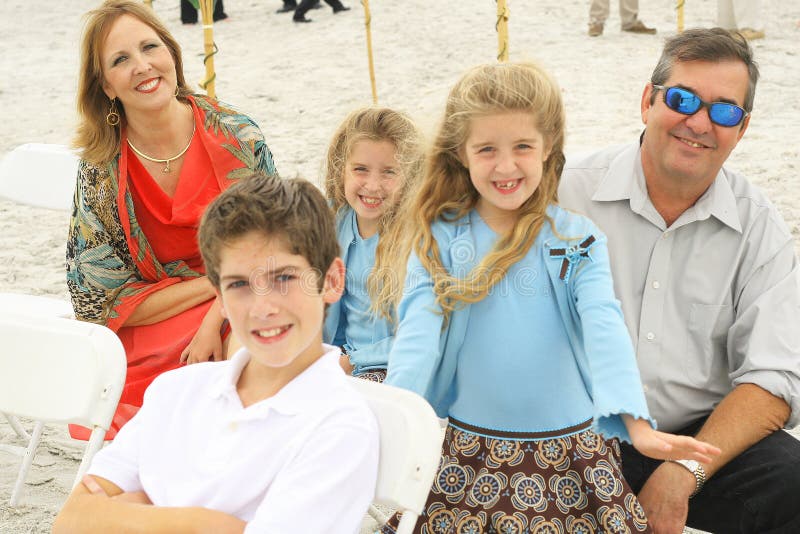 Happy gorgeous family at the beach royalty free stock photos Happy gorgeous family at the beach royalty free stock photos