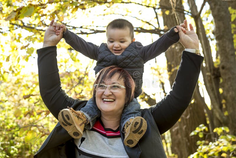 Happy Grandma With Grandson Outdoor Stock Photo Image Of Happiness