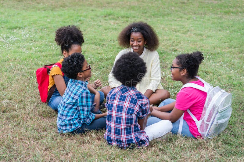 A group of african children playing in a park