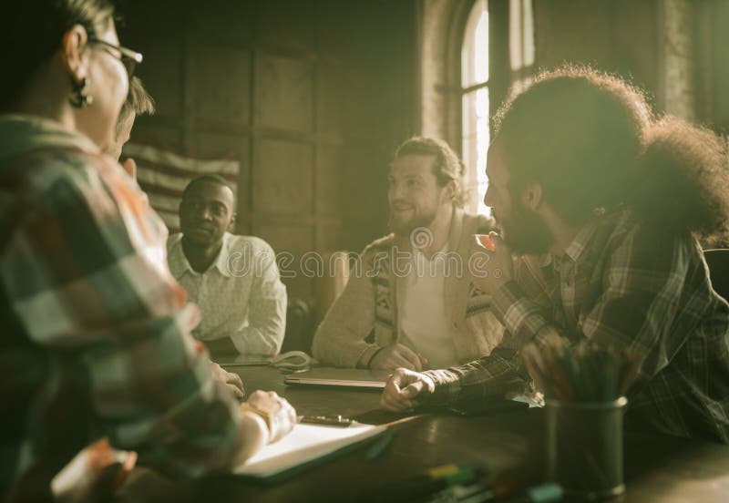 Happy Group Of Business People Brainstorming In Office