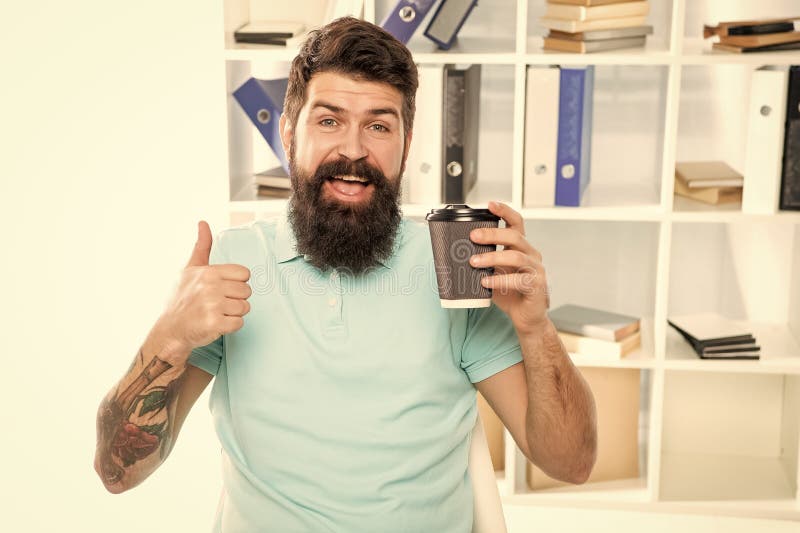 Happy Guy Giving Thumb Gesture Holding Takeaway Coffee Cup in Office